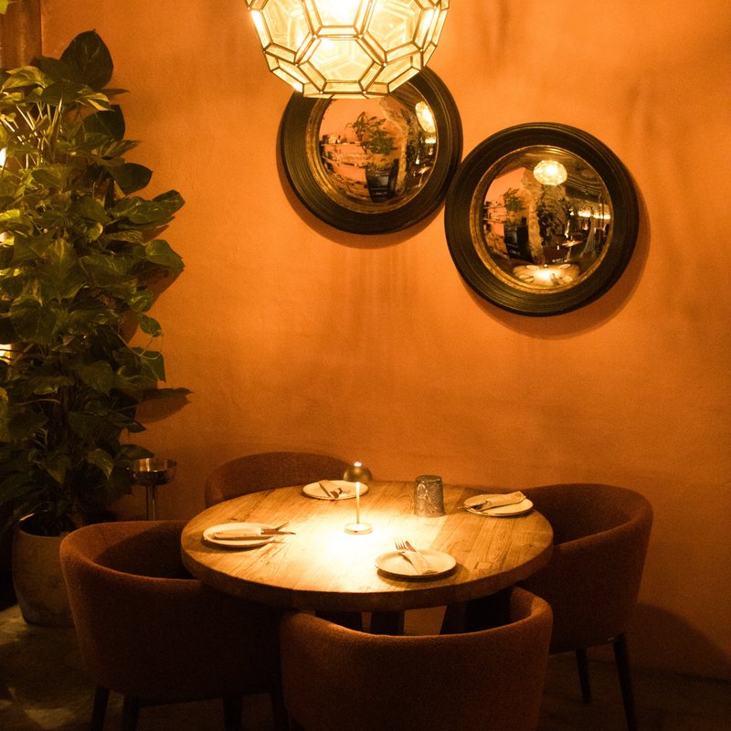 A quiet corner table — Casa 26, Marbella